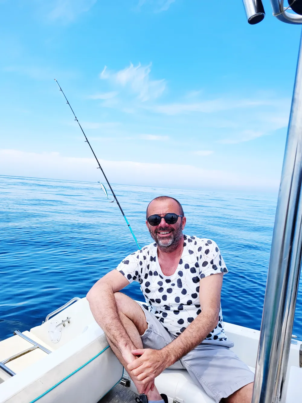 portrait-young-woman-boat-sea-against-sky